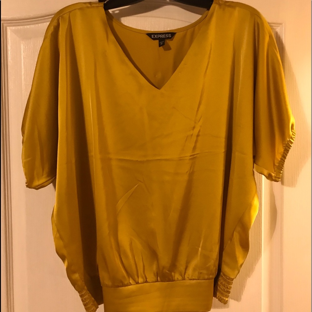 Express gold top with cute detailing in size XS